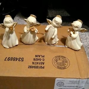4 Vintage Angels playing musical instruments